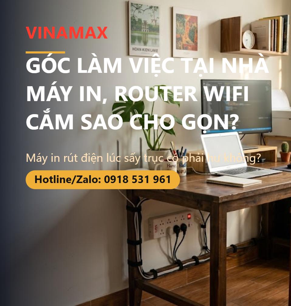 Góc làm việc tại nhà với máy in, router wifi, ổ cắm nhiều cửa dưới bàn