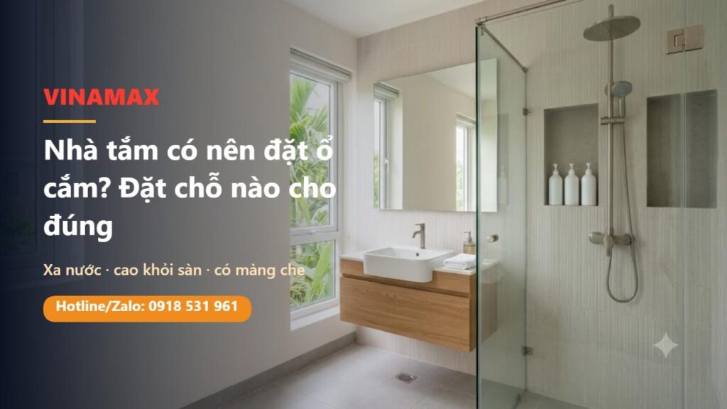 Nhà tắm gia đình Việt Nam sạch sẽ với bồn rửa mặt, gương và buồng tắm kính